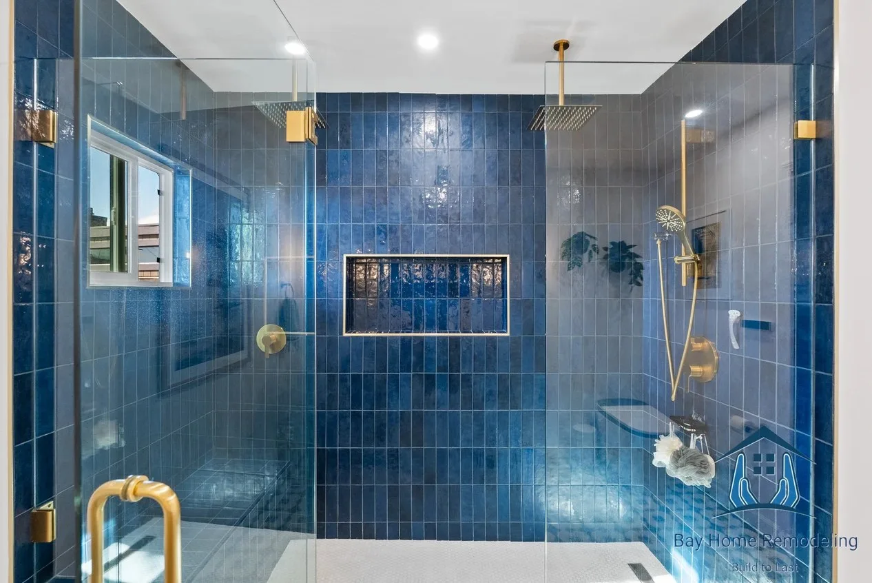 Walk-in shower remodel in Walnut Creek CA with blue tile and brass fixtures