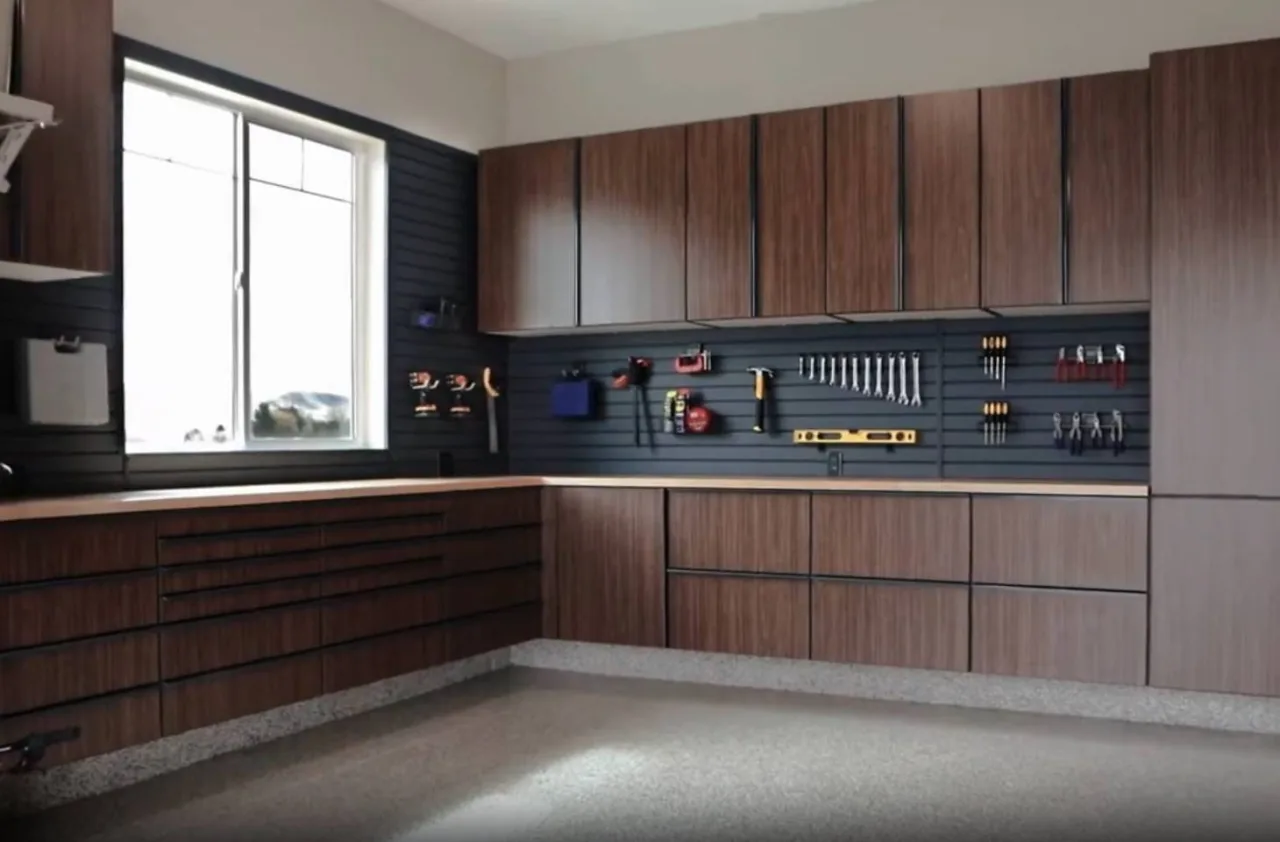 Custom walnut garage cabinets with built-in workbench in Concord CA