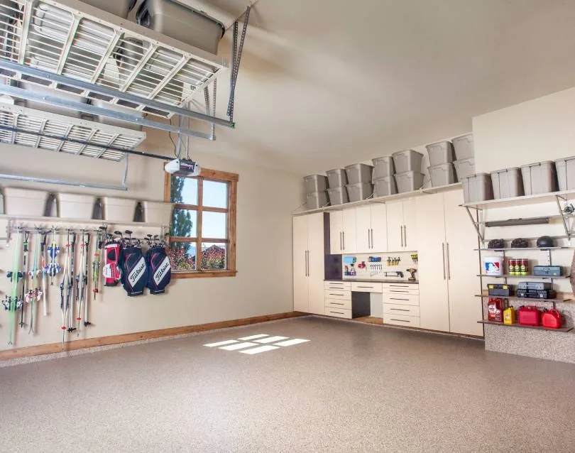 Complete garage organization system with cabinets, overhead racks and epoxy floor in Concord CA