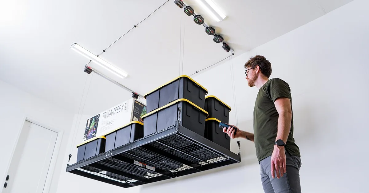 Motorized overhead garage storage lift installed in a Concord area garage