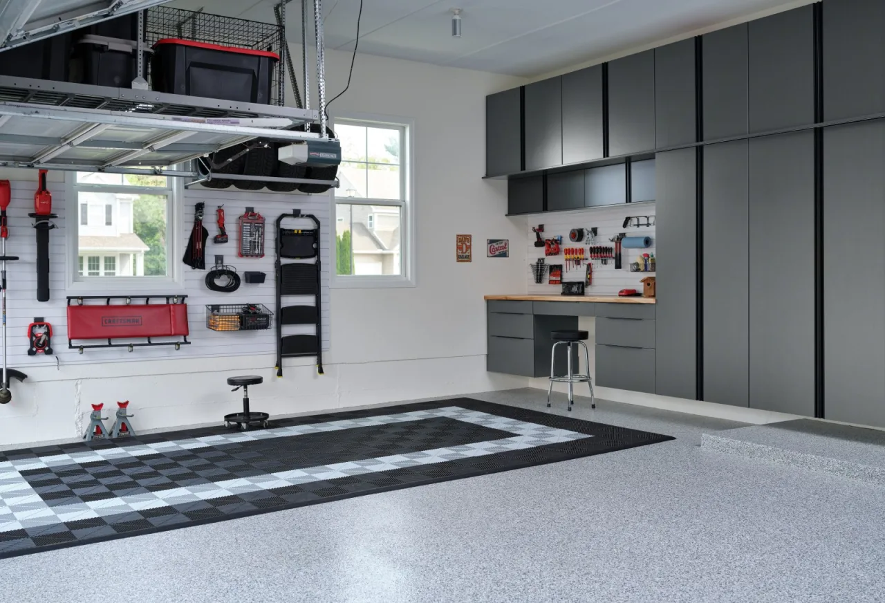 Grey custom garage cabinets with overhead storage racks in Concord CA