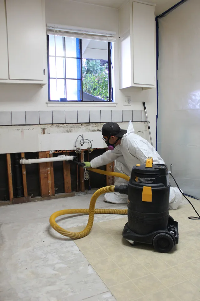 Cleaning the opened kitchen wall, Oakland